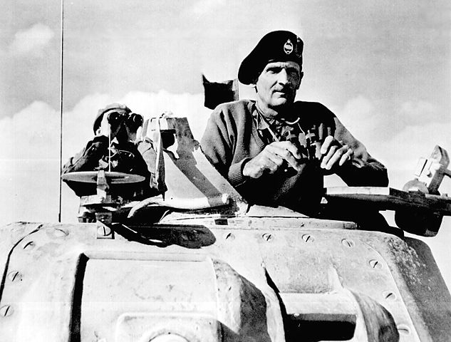 File:Montgomery watches his tanks move up.jpg