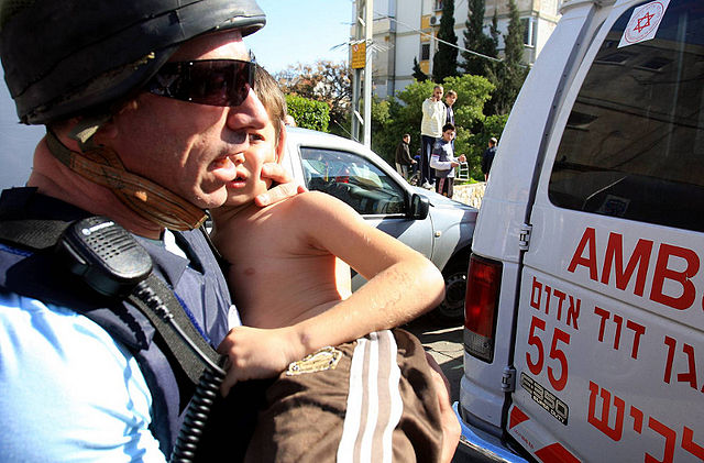 File:A wounded Israeli Child is taken to hospital after Rocket Attack.jpg